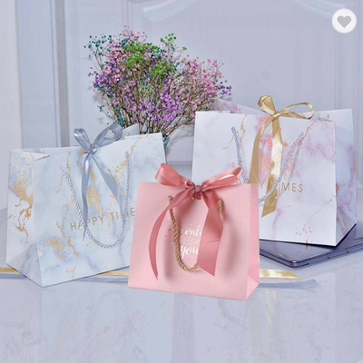 Good price CMYK Small Wedding Ribbon Handle Gift Bags Thank You Paper Bag 300gsm online